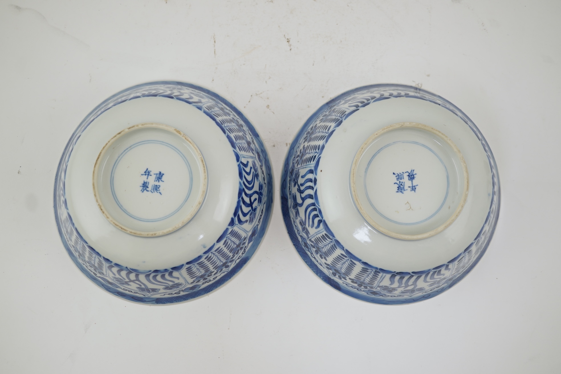 A pair of Chinese blue and white bowls, Kangxi four character mark, 19th century